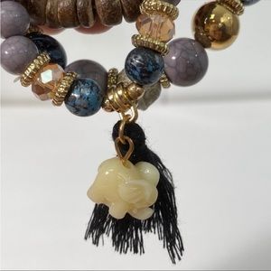 NWOT Boho Lucky Elephant Beaded Bracelets
Set of 3 Purple Gold Brown Bohemian
